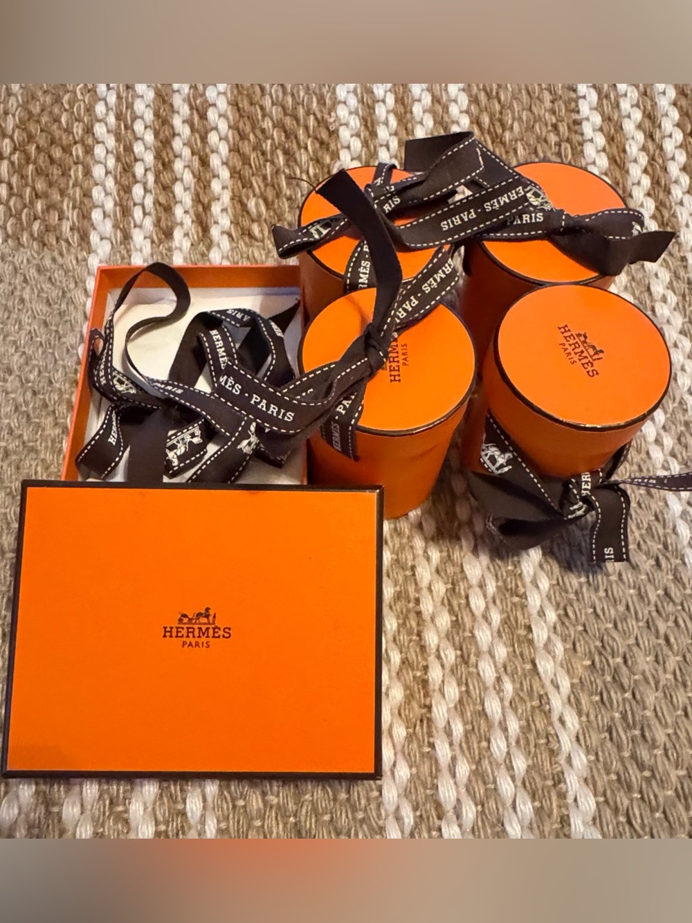 Hermès Orange Boxes with Black Branded Ribbon